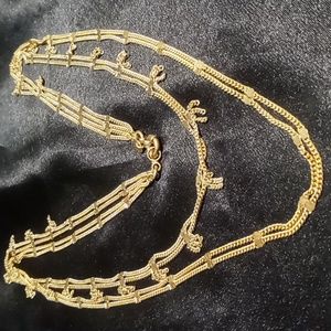 Monet layered gold tone necklace.